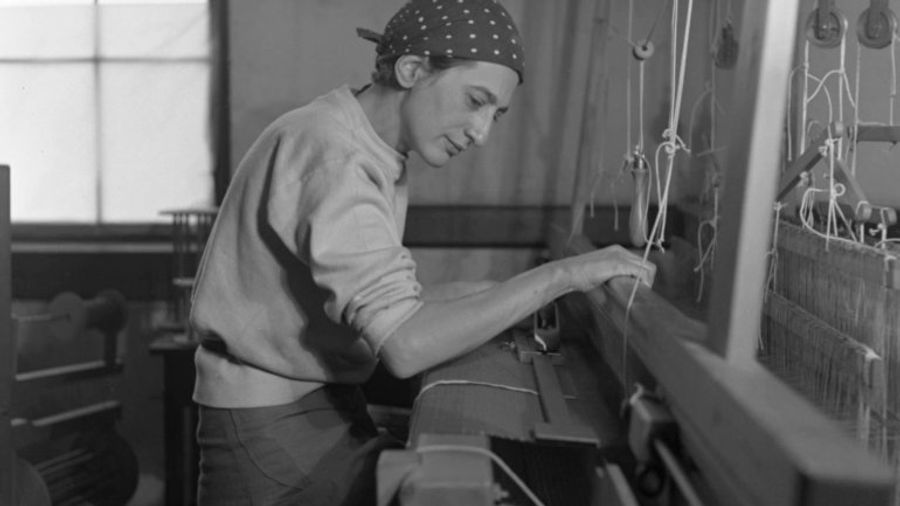 Anni Albers in her weaving studio at Black Mountain College in 1937, photo by Helen M. Post.