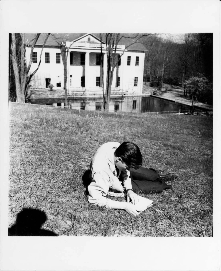 Student (possibly Don Page) reading on the Blue Ridge campus