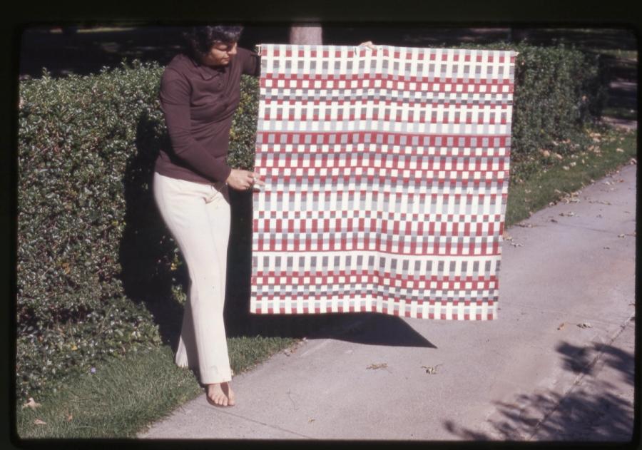 Marilyn Bauer with weaving.