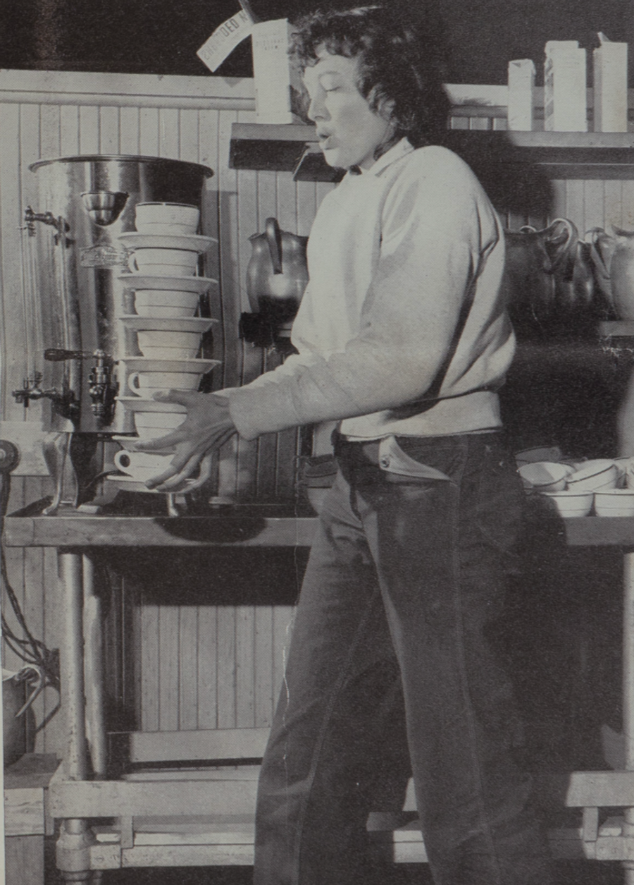 Connie Spencer balances seven cups.