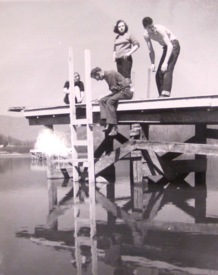 Bas Allen working with students to repair the platform on Lake Eden