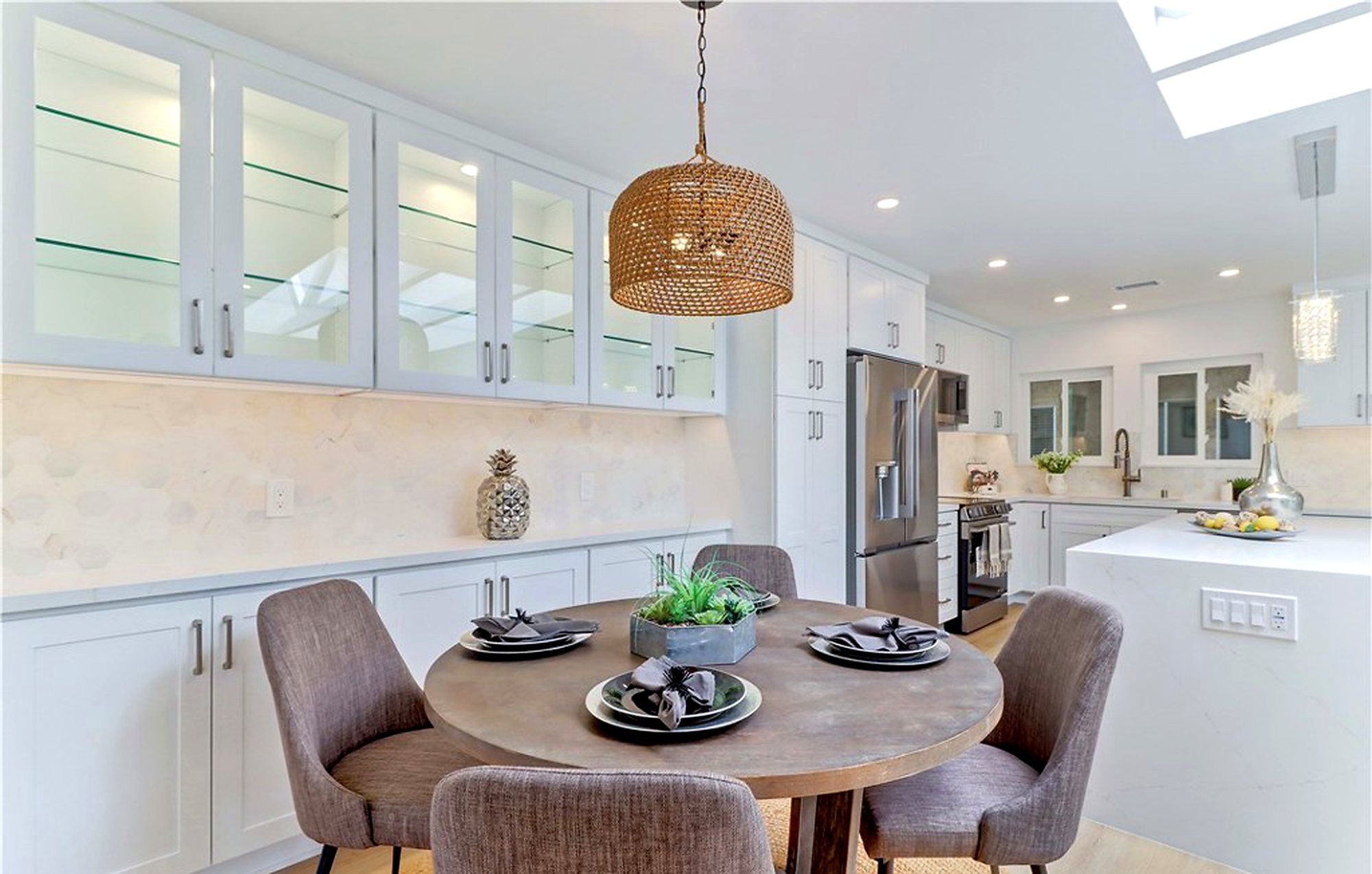 Dining nook with glass-front cabinets, next to the kitchen, Laguna Woods