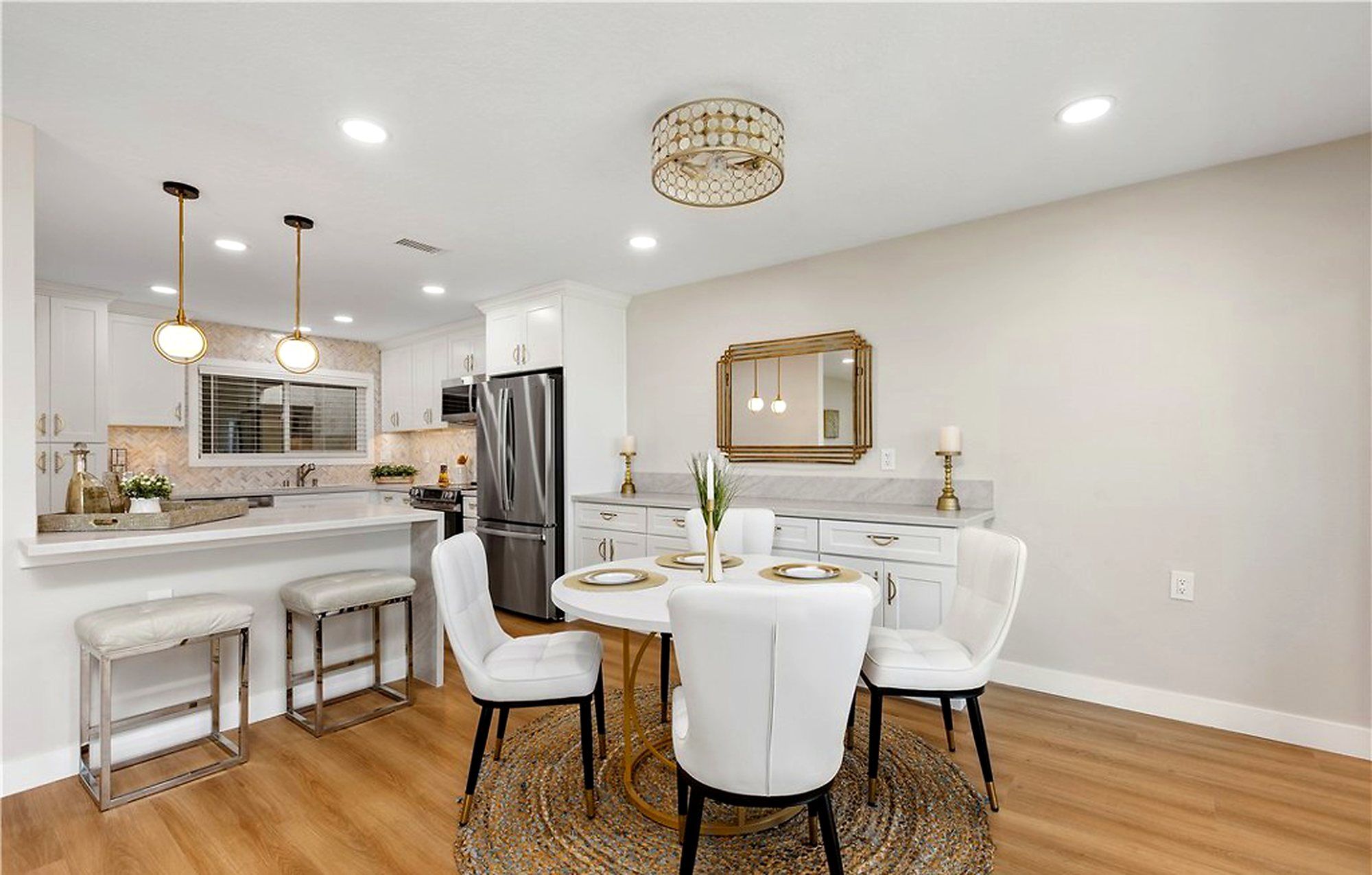 White kitchen seen from the dining table, Laguna Woods