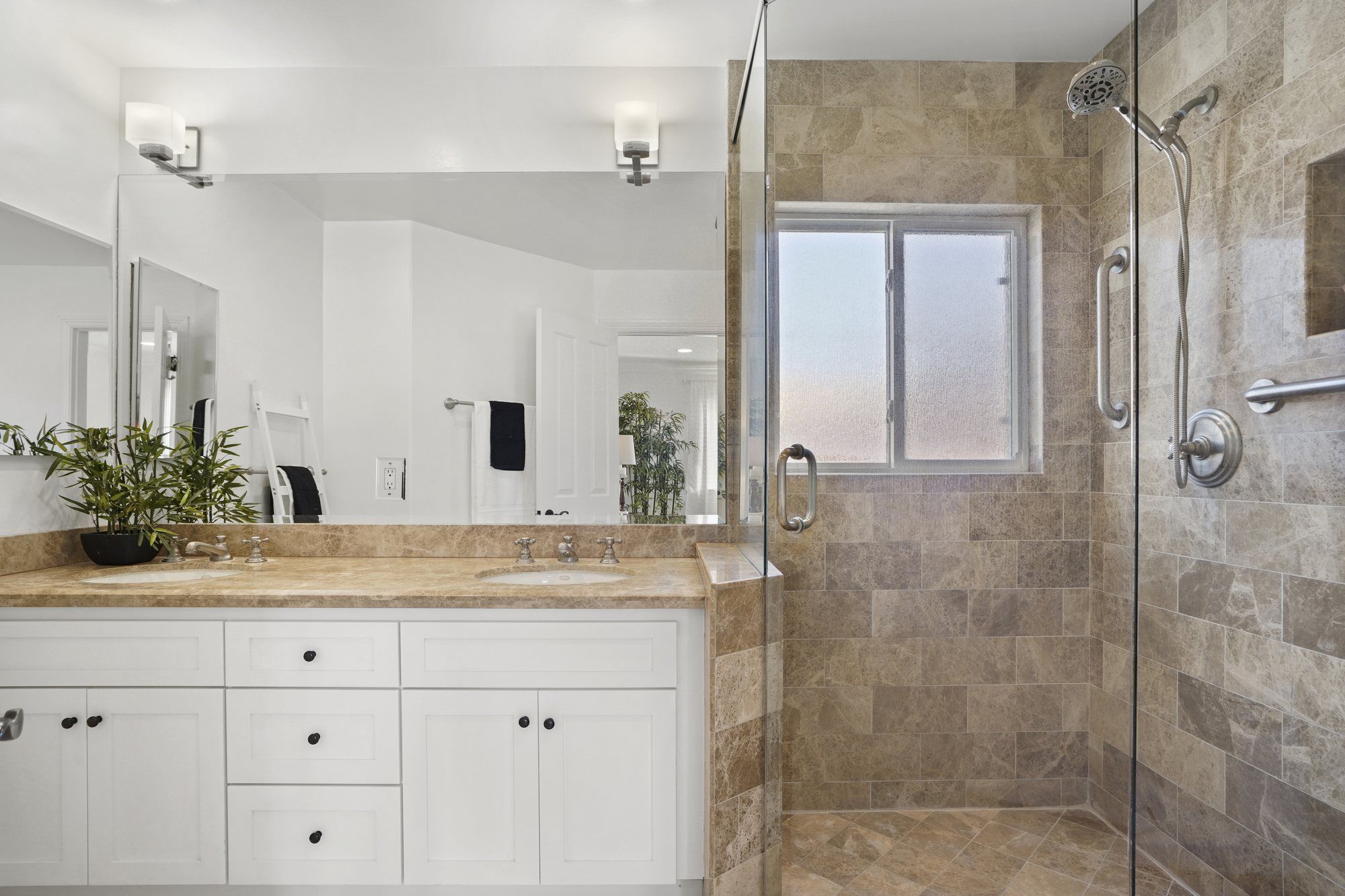 Bathroom with a white vanity and a stone-tile shower, Newport Beach