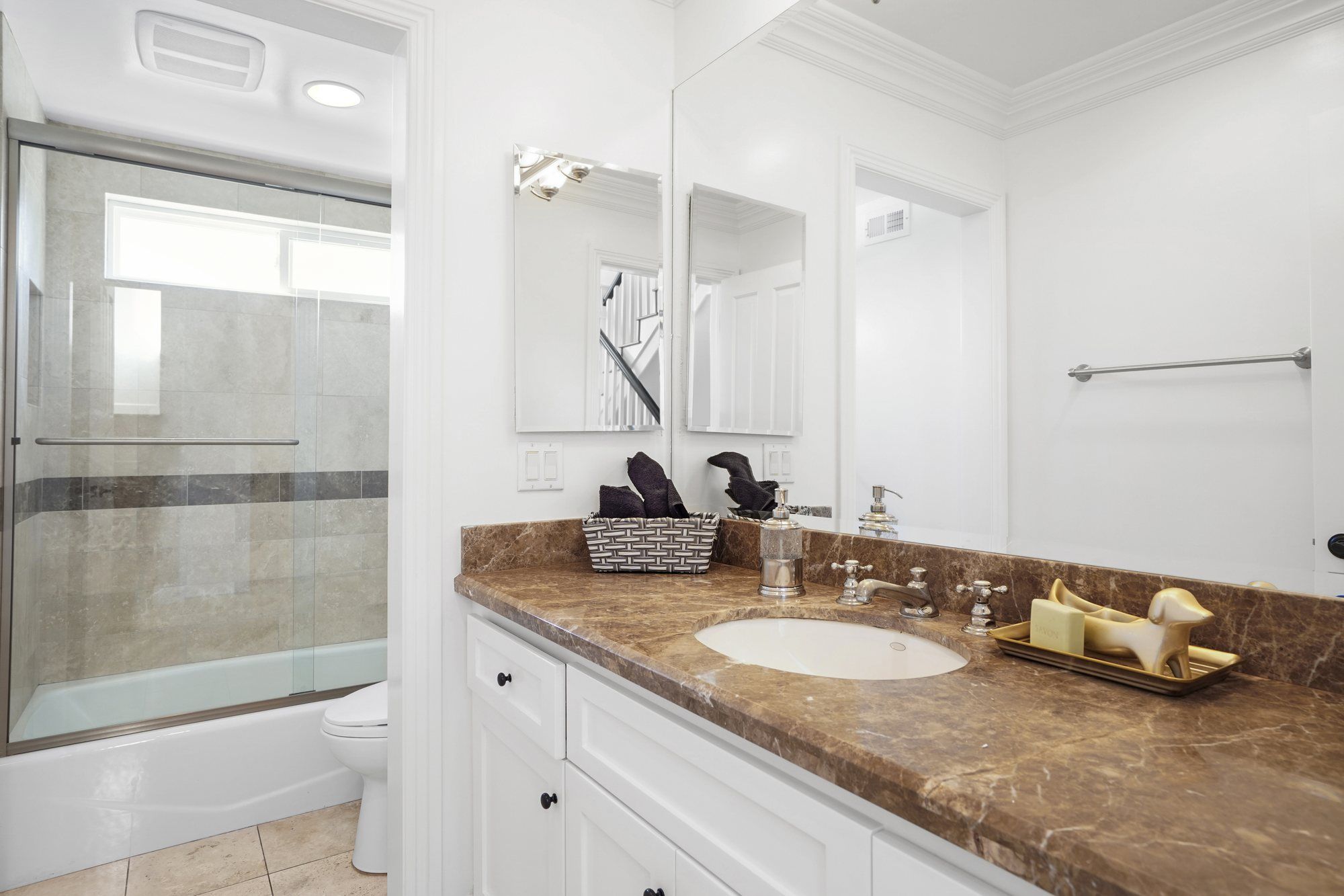Bathroom with a brown marble counter, Newport Beach