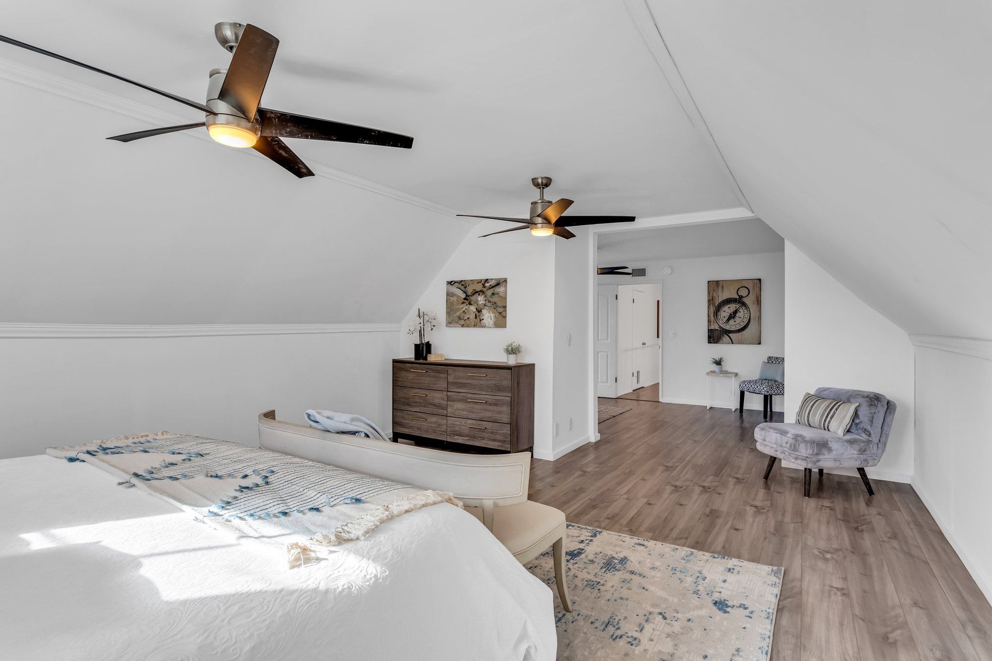 Upstairs bedroom under a sloped ceiling, Tustin