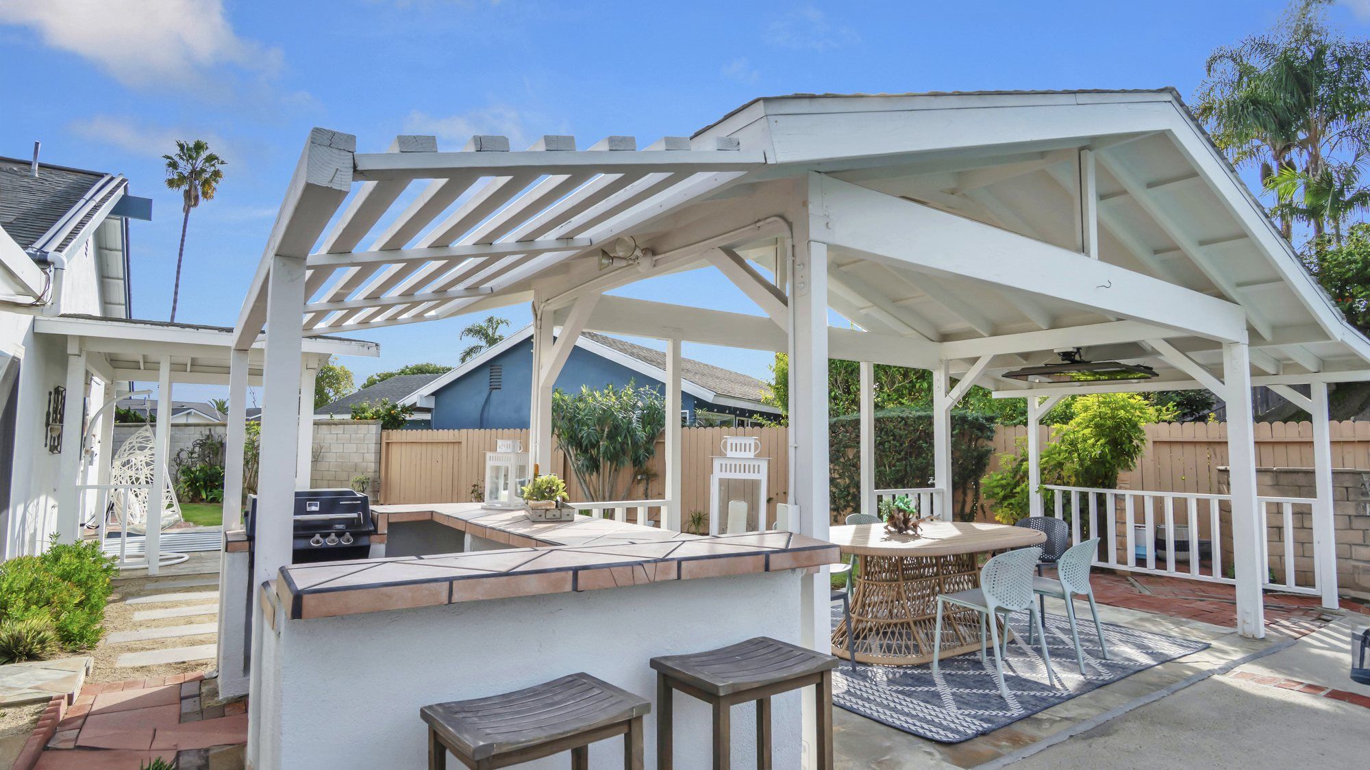 Outdoor bar under a white pergola, Dana Point