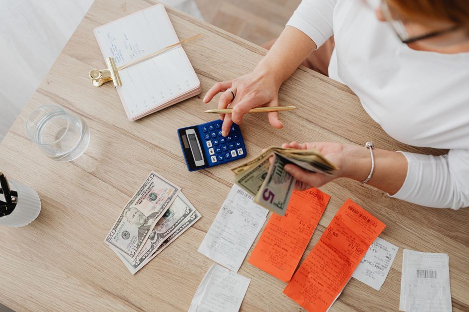receipt with handwritten notes on table