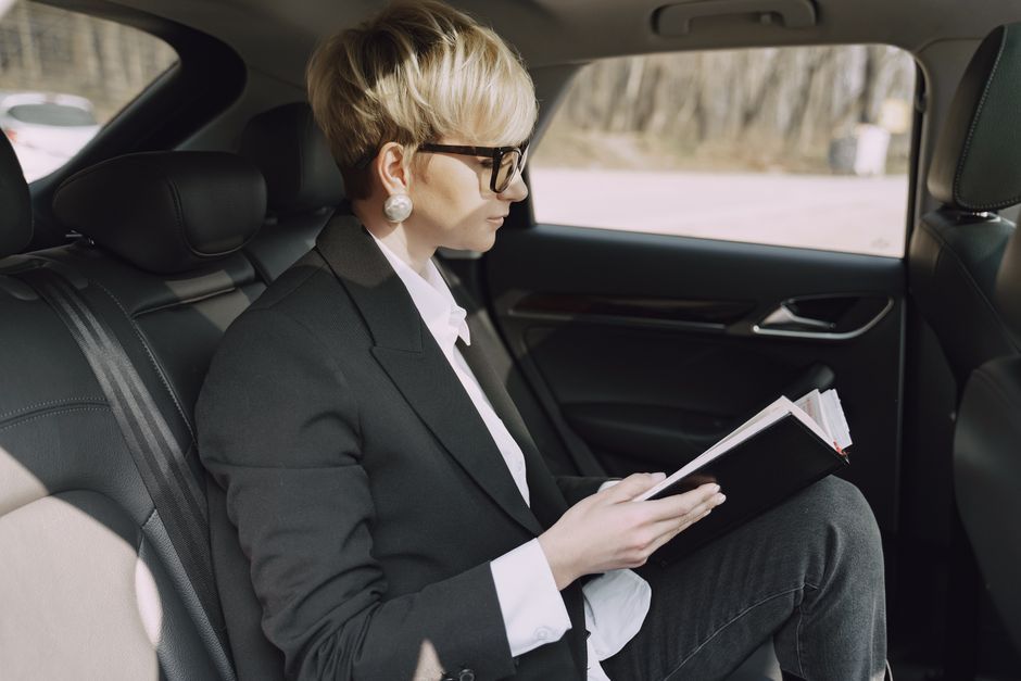notebook with mileage log on passenger seat