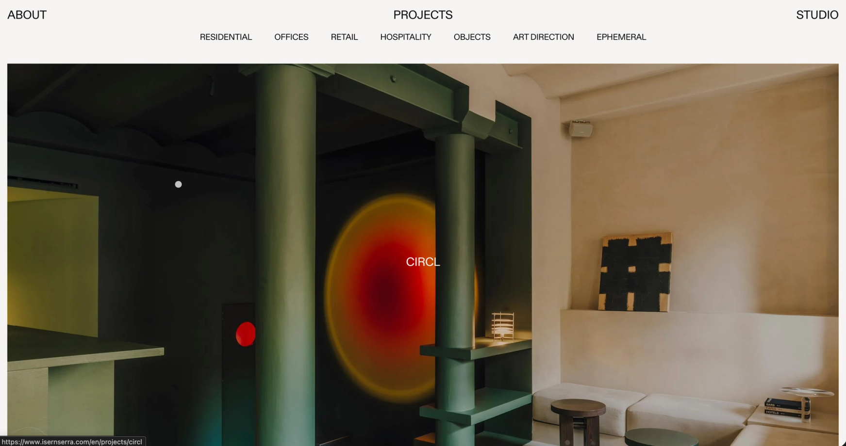 Projects page with the typology filters and a photograph of the CIRCL interior with a glowing red circle