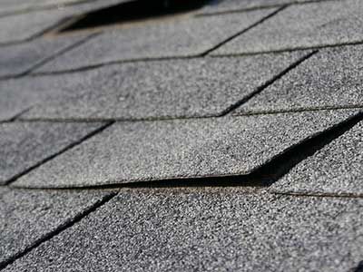 Lifted shingles after windstorm