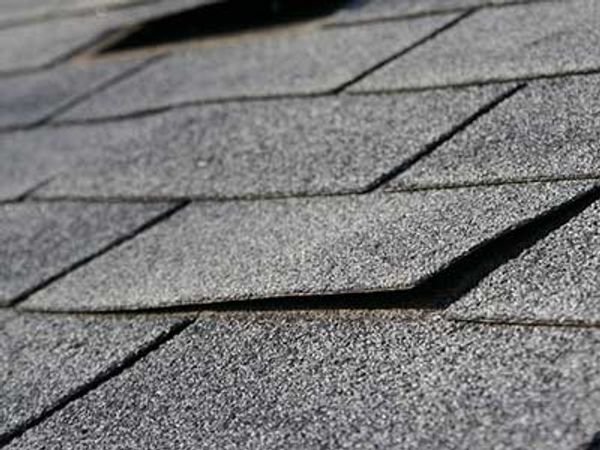Lifted shingles after windstorm
