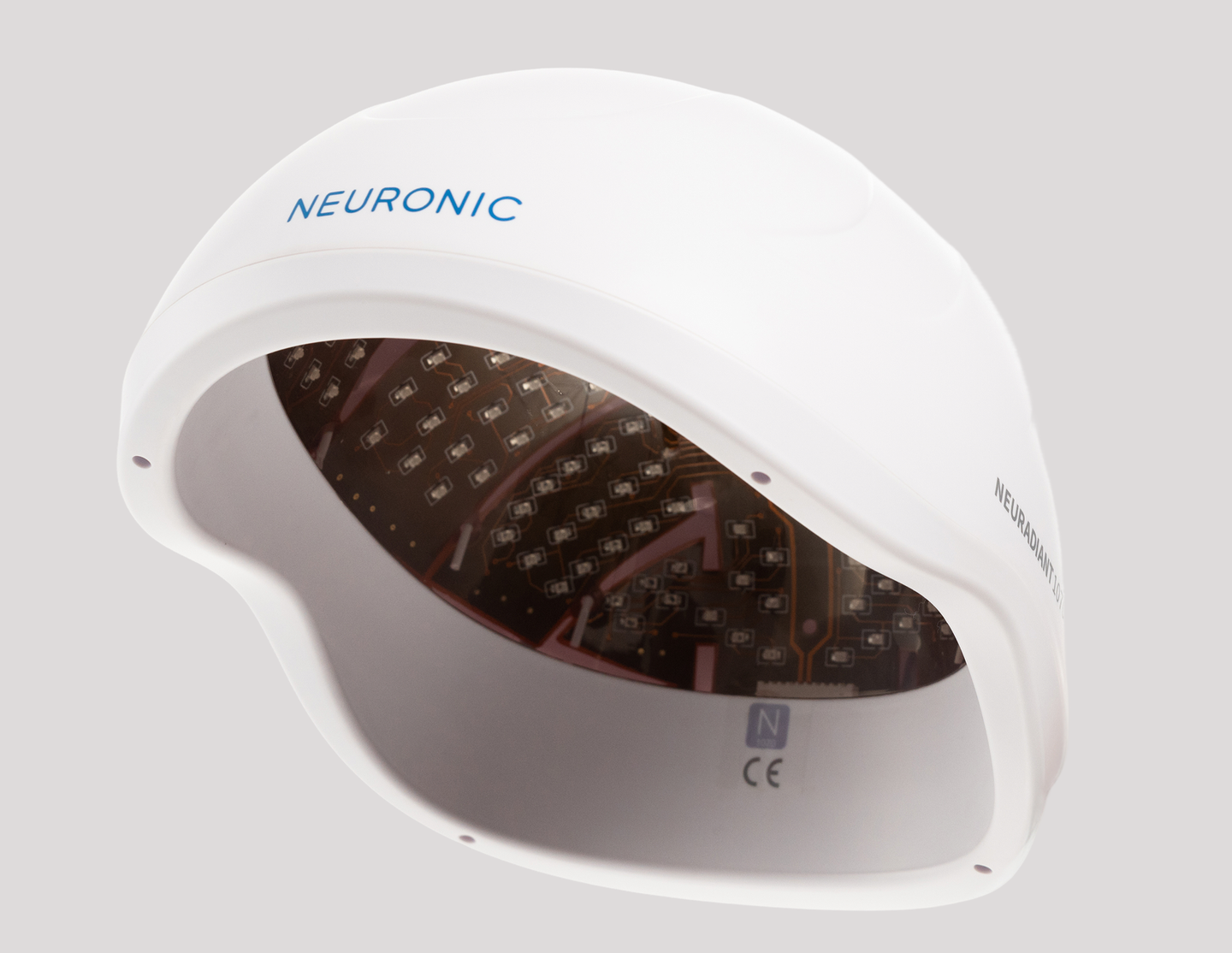 Neuronic Helmet with white exterior casing, interior view showing dark red circuit board with multiple LED diodes arranged in grid pattern