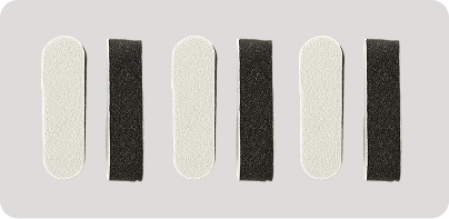 Six rectangular pads alternating between white and dark gray, arranged in three pairs on a light gray background