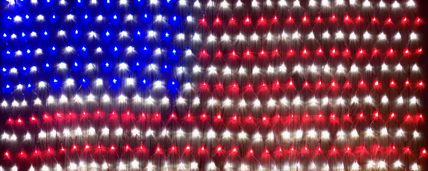 Grid of blue, white, and red LEDs arranged in horizontal stripes forming an American flag pattern