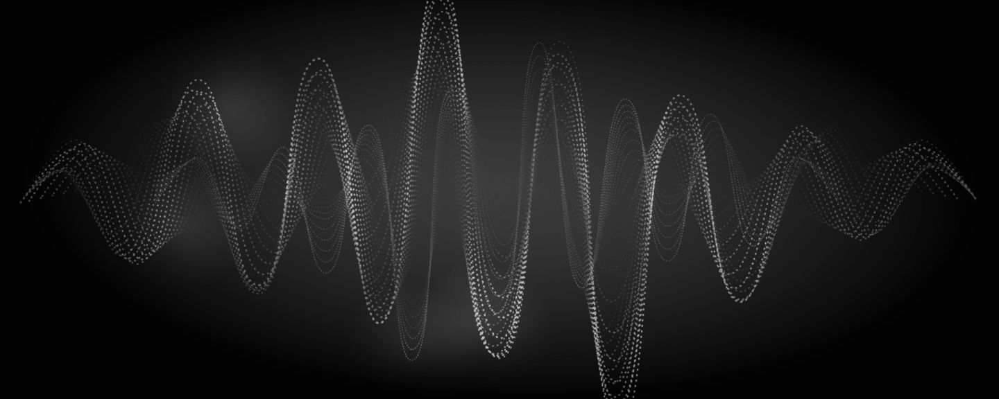 Abstract waveform visualization with particle dots forming undulating wave patterns against a dark background