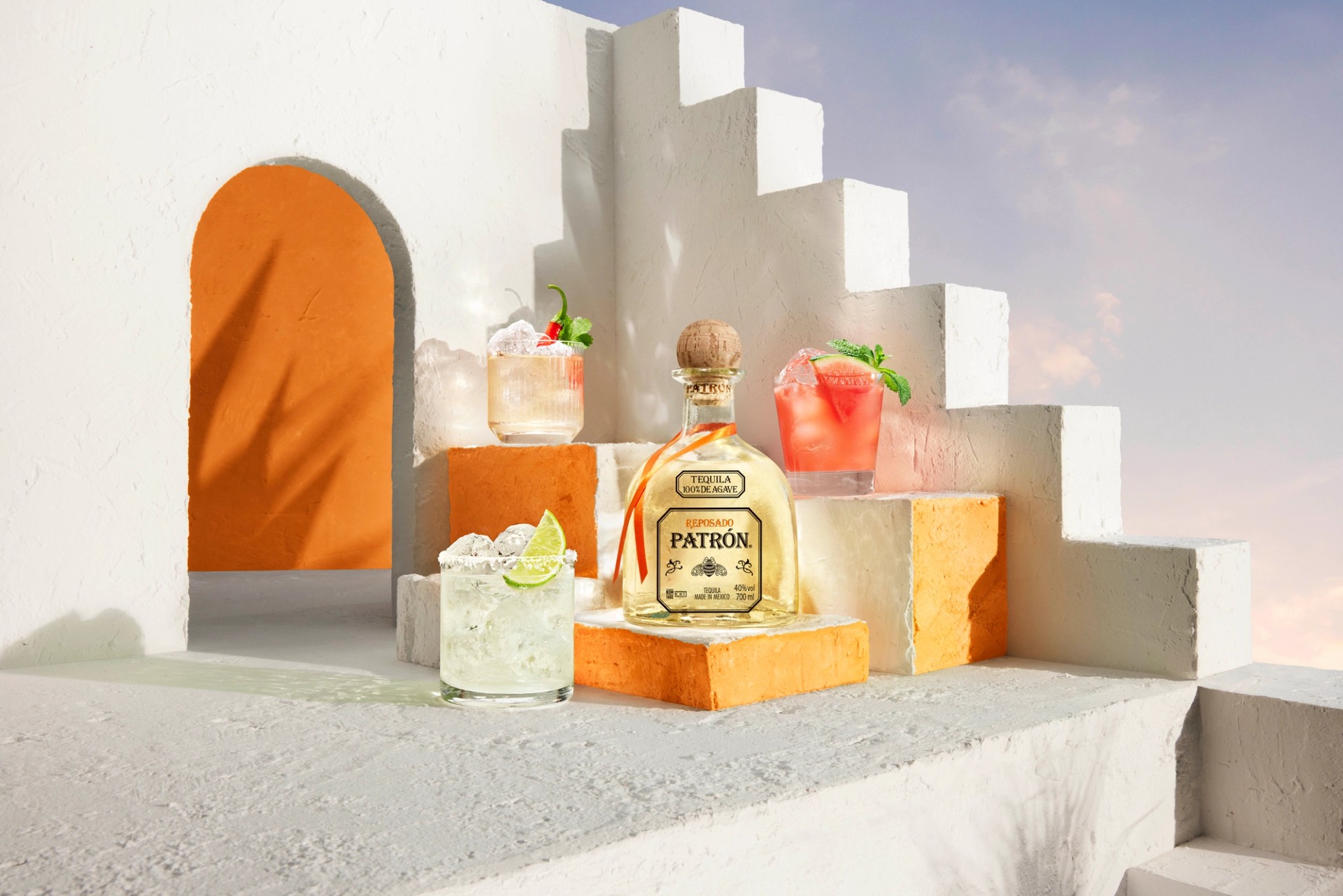 Collection of Patron Cocktails with beautiful garnishes in a custom-built Mexican-inspired set photographed by Jason Bailey Studio