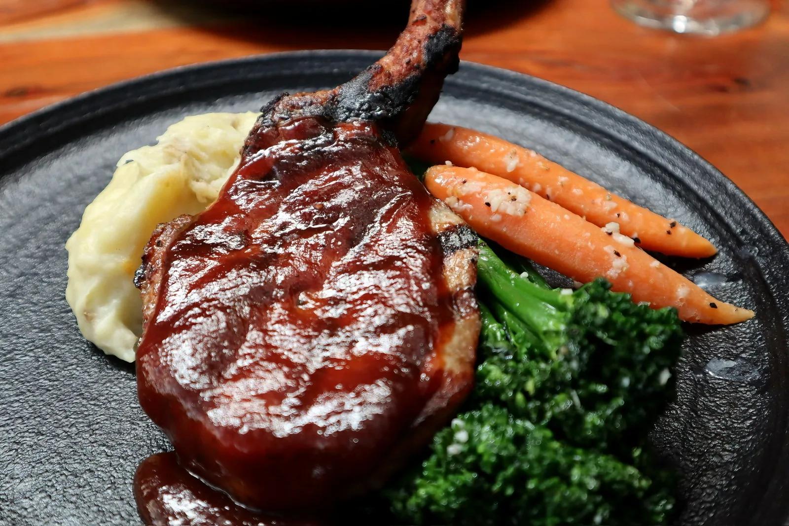 Pork chop served before an Ivan'z House show
