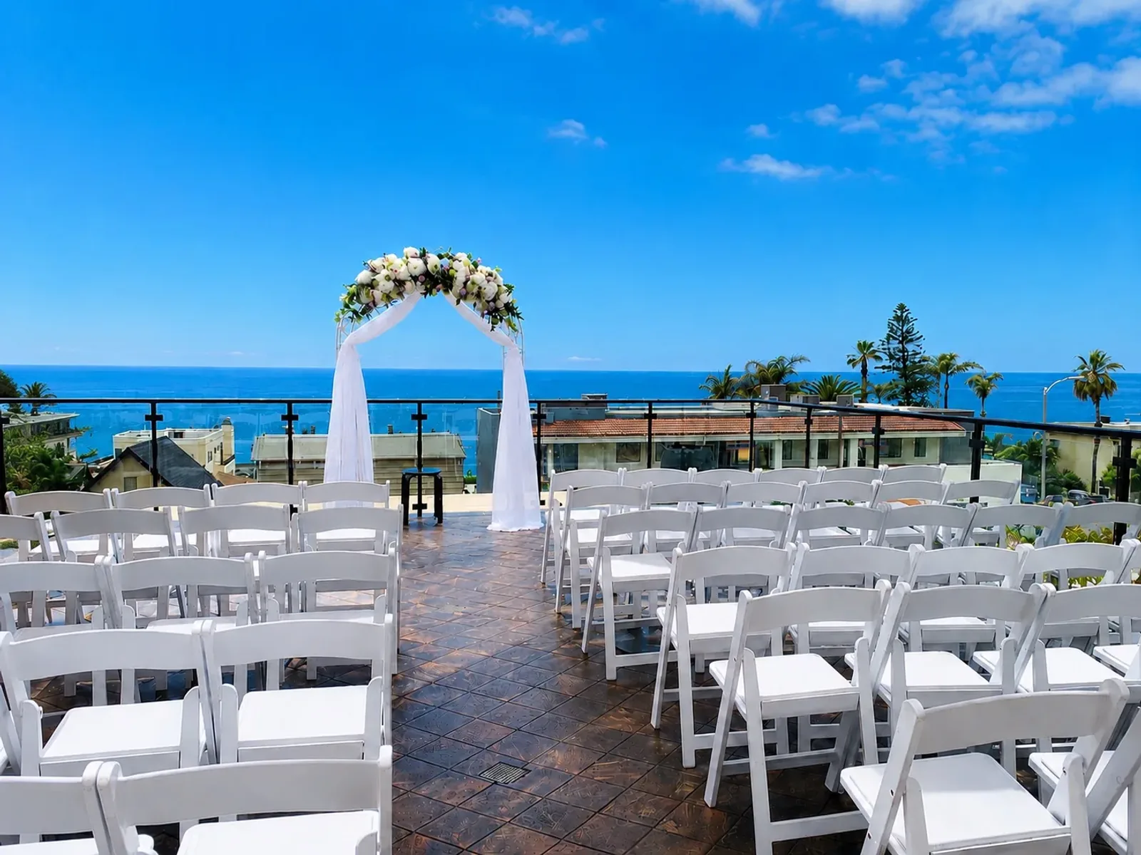 Rooftop wedding ceremony overlooking the Laguna Beach coast
