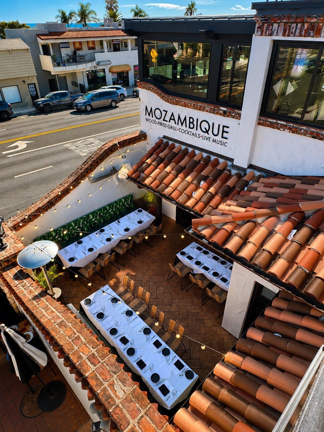 Overhead view of the Palm Patio set for an event below the Mozambique sign