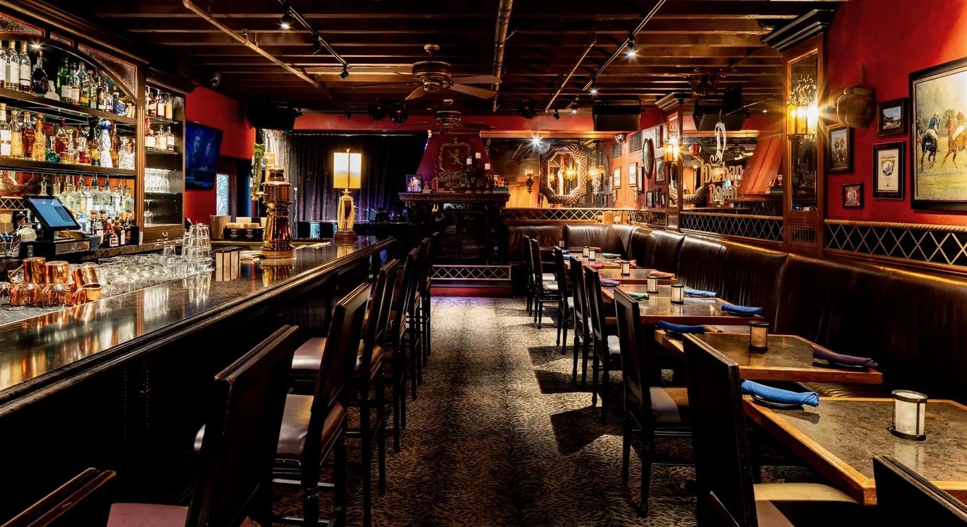 Durban Room private dining at Mozambique — fireplace, piano, intimate setting