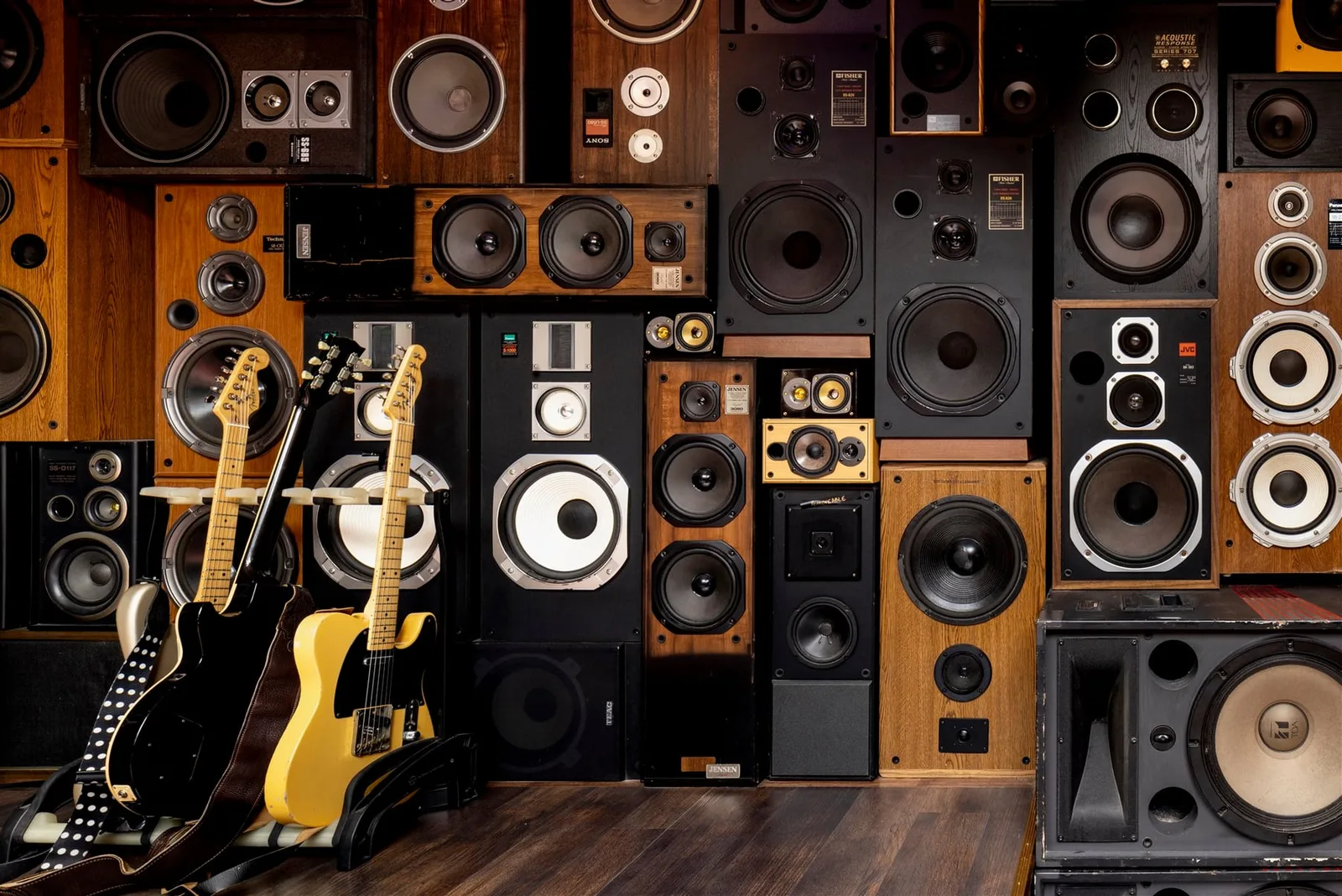 The vintage speaker wall and guitars at Ivan'z House