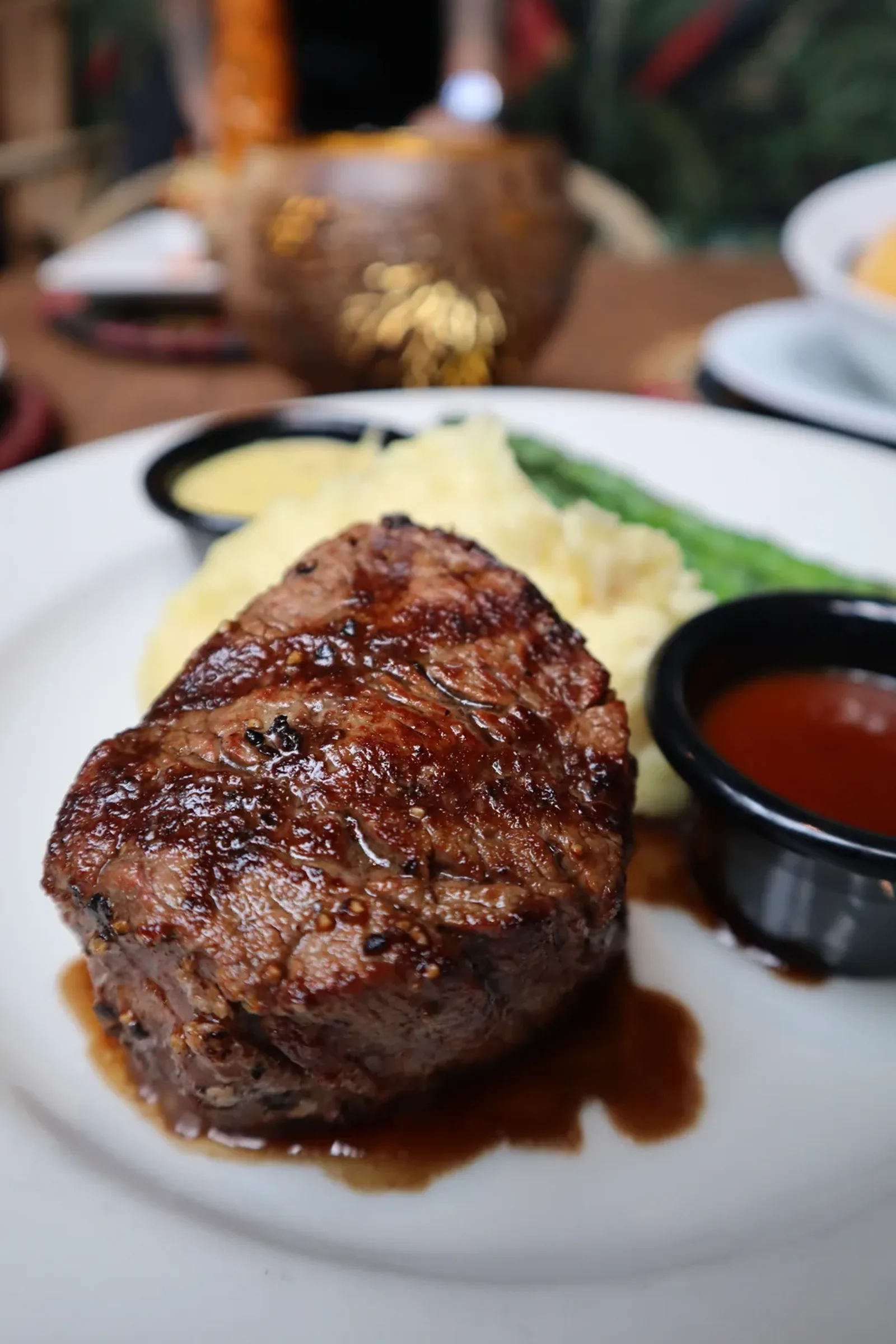 Wood-fired steak over oak flame at Mozambique