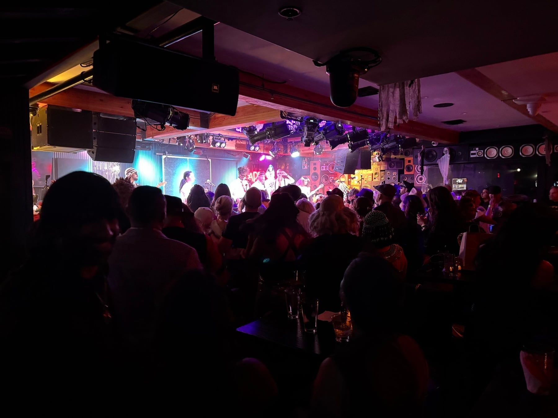 Crowd watching a band at Ivan'z House Live