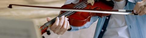 A musician plays the violin