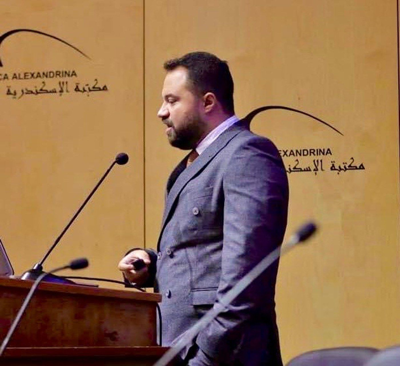 Dr. Mohammad Alsaadany, MEA Director at BioNixus, speaking at Bibliotheca Alexandrina during a formal presentation