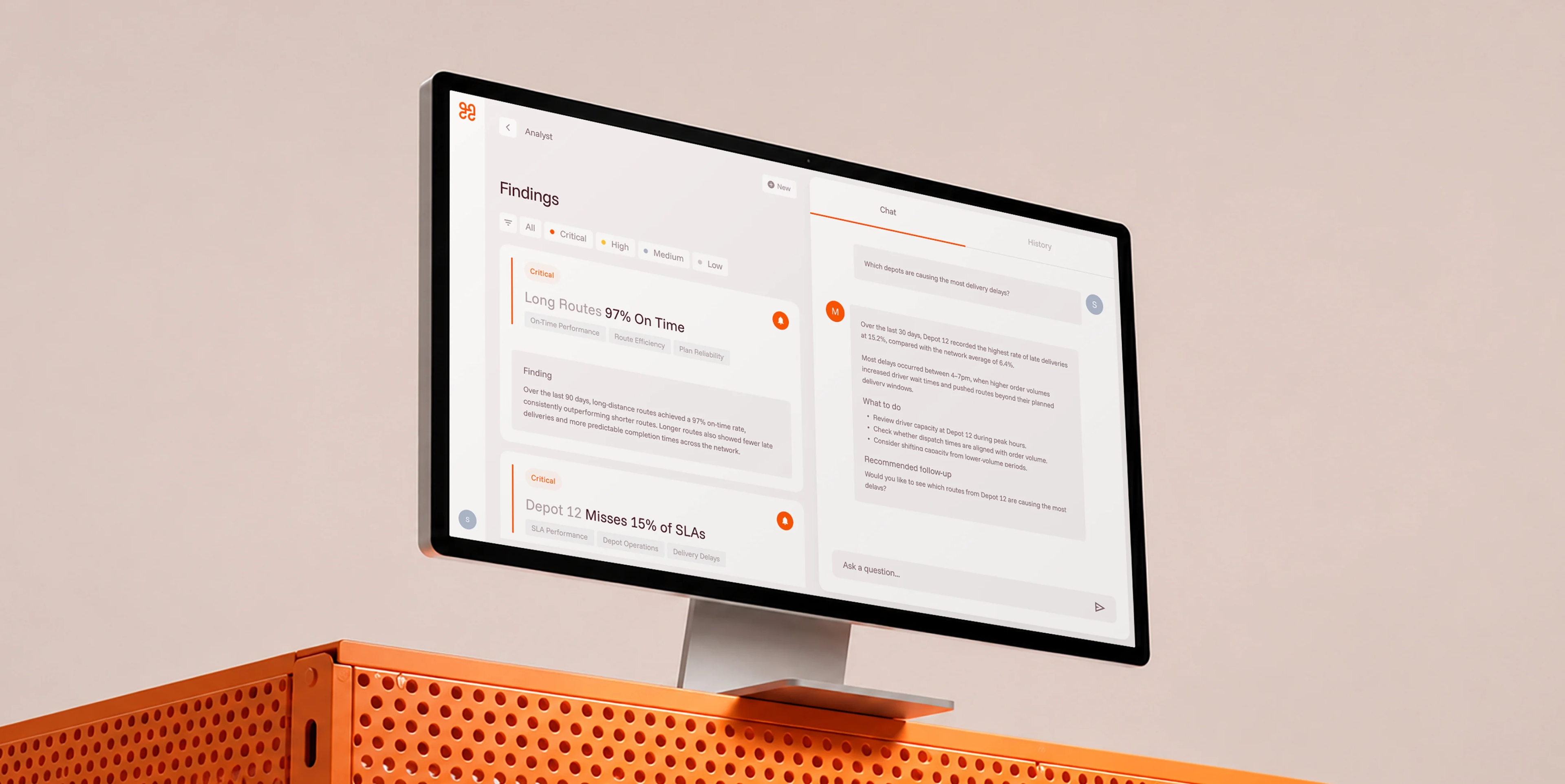 A monitor showing the Bringg dispatch map and route sidebar