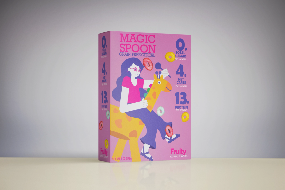3D mockup of the Magic Spoon Fruity cereal box, featuring a pink package with a playful illustration of a person riding a giraffe and colourful cereal rings surrounding the design