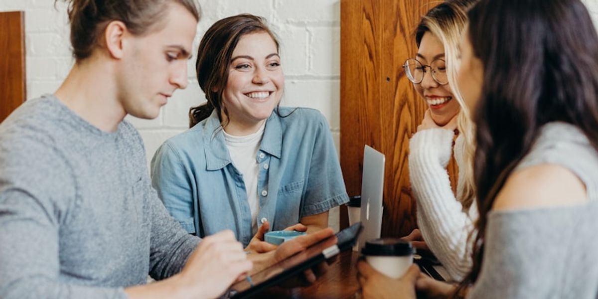Small consulting team in strategy discussion