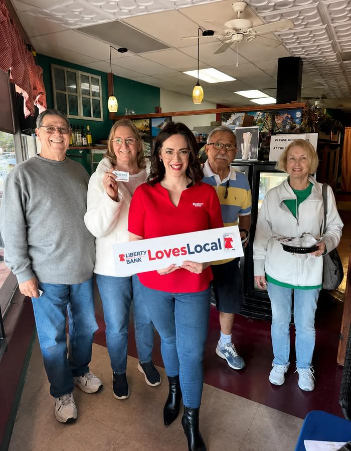 Liberty Savings Bank team connecting with local business owners