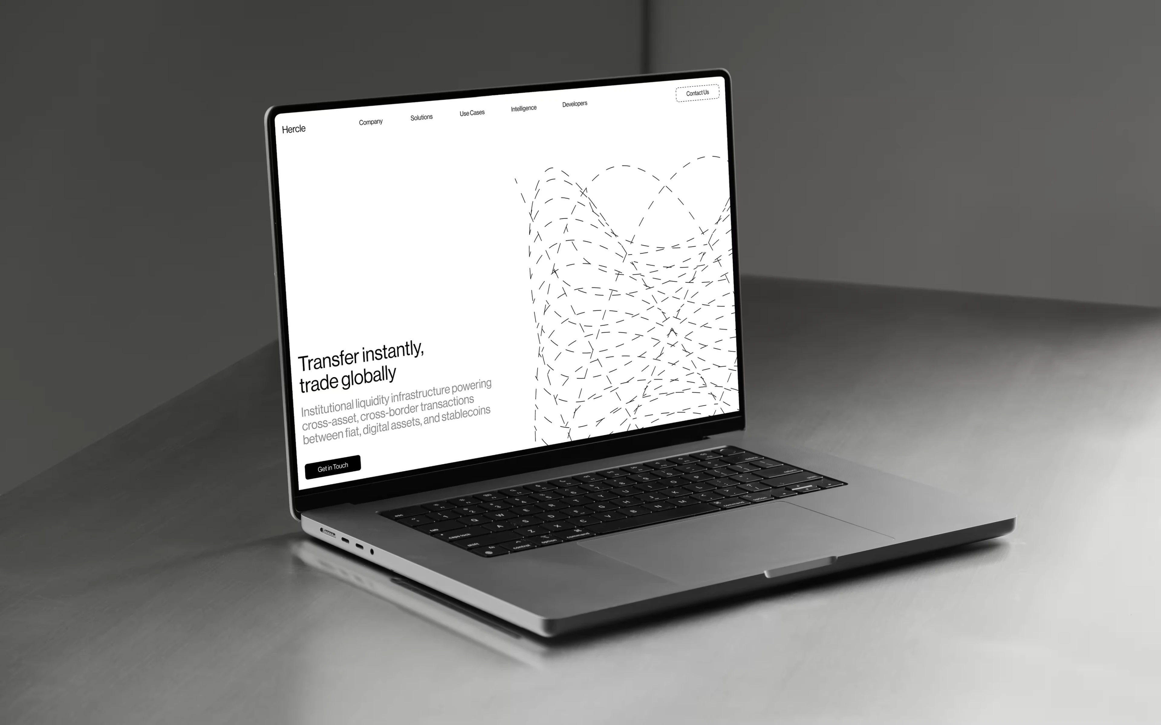 Hercle website on a laptop: transfer instantly, trade globally