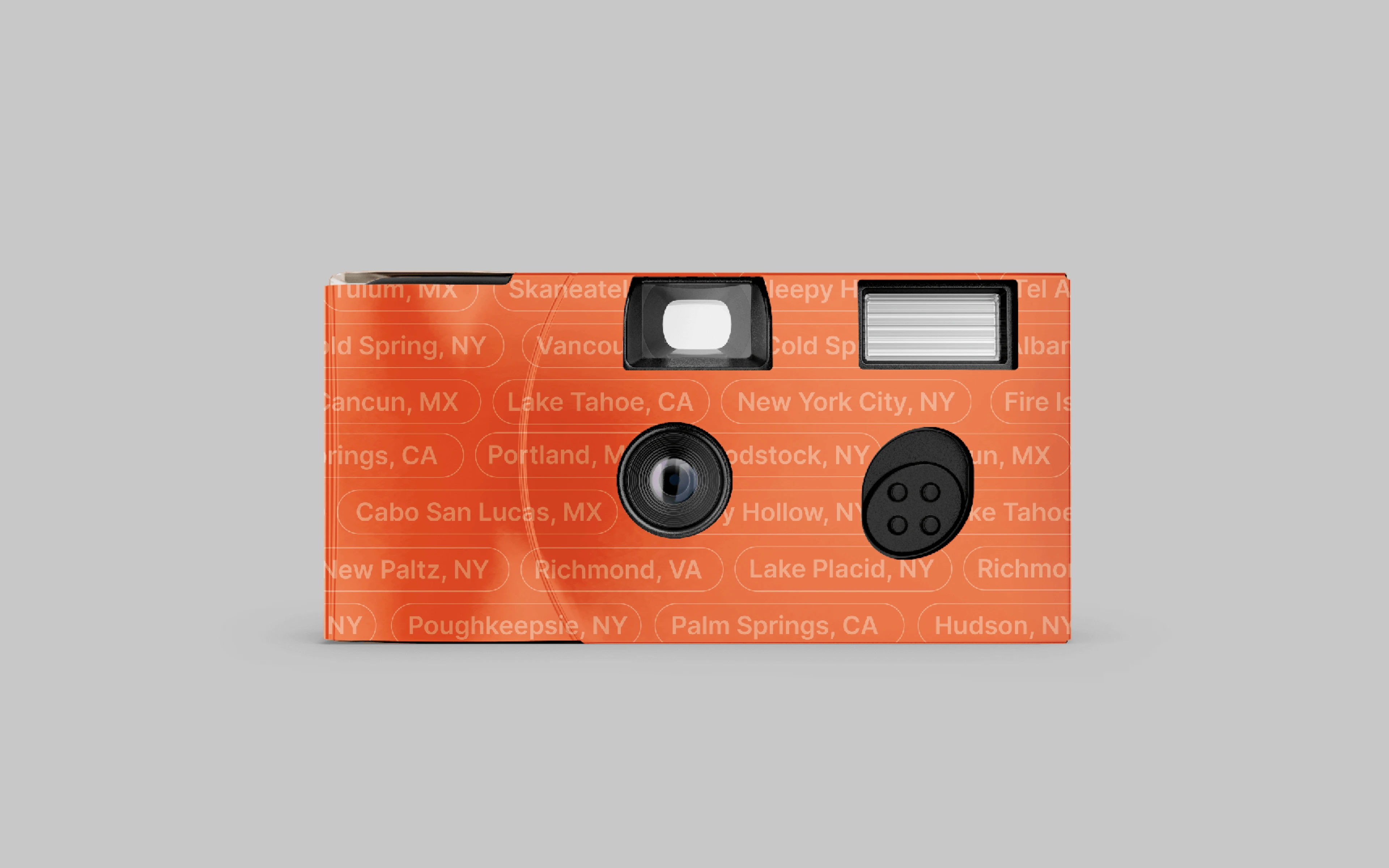 A feeel branded disposable camera in blood orange
