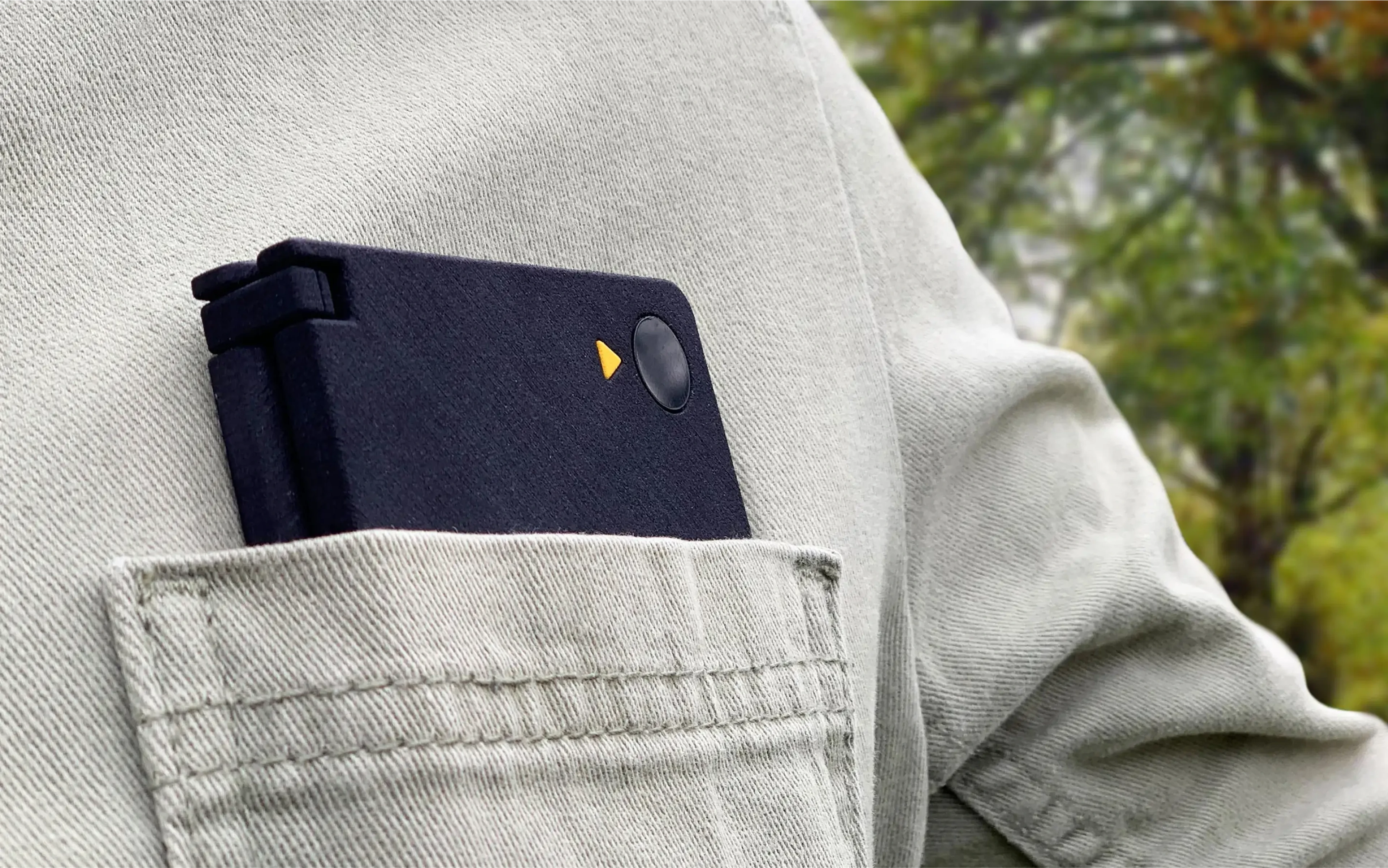 Ash AI Pokedex tucked into a shirt pocket