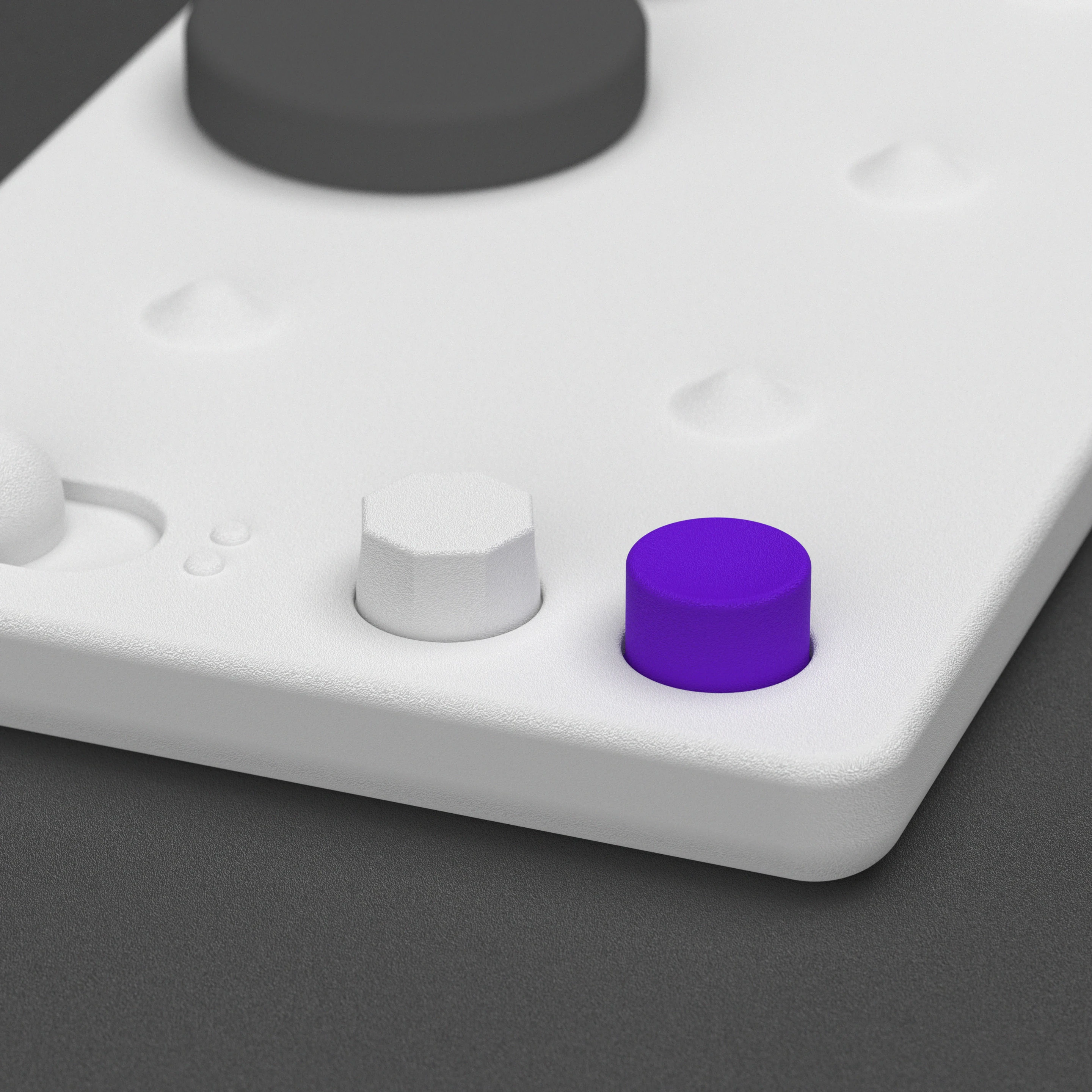 Detail of LUII's purple read button and the white dial