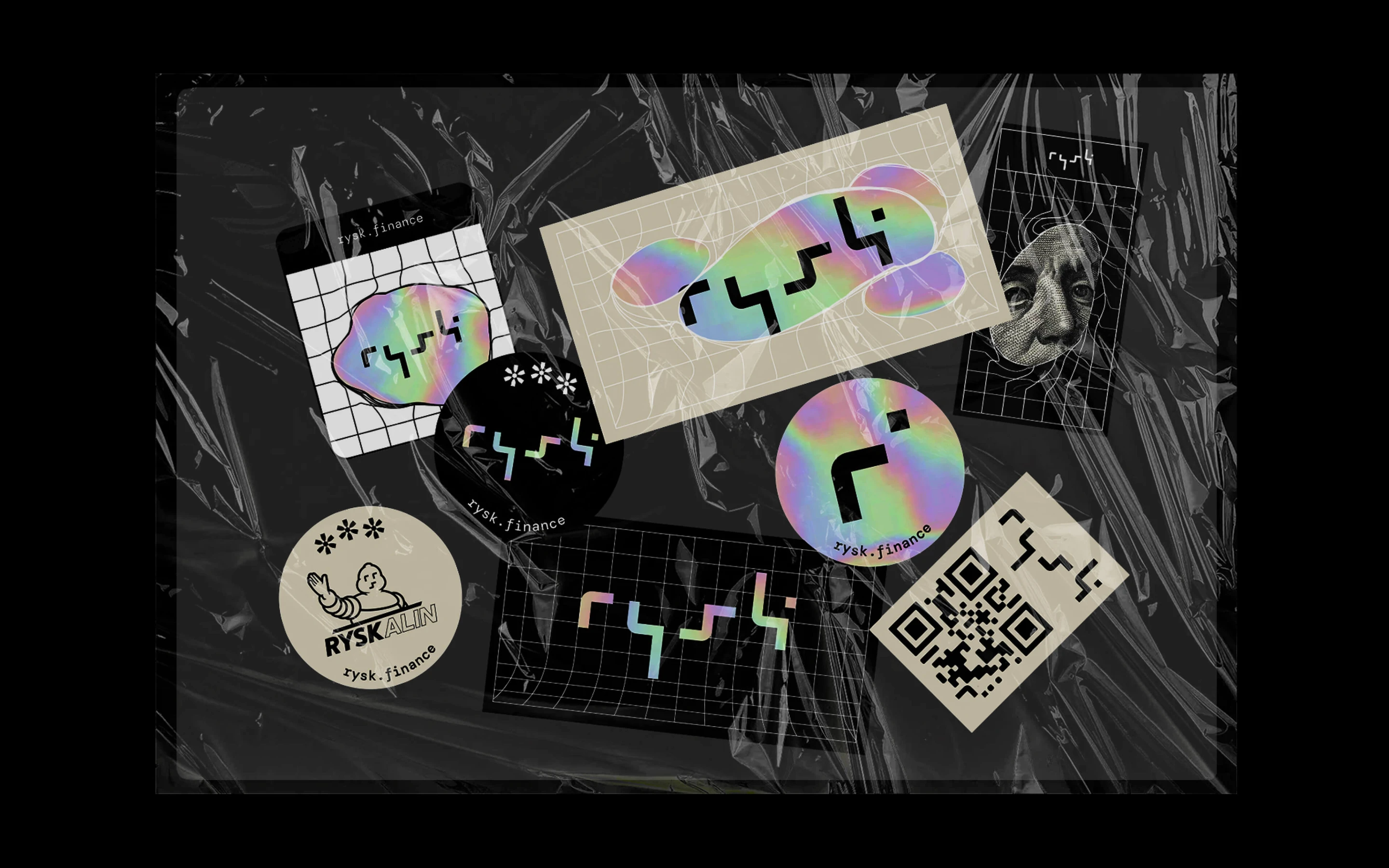 Rysk stickers and printed collateral on a dark grid