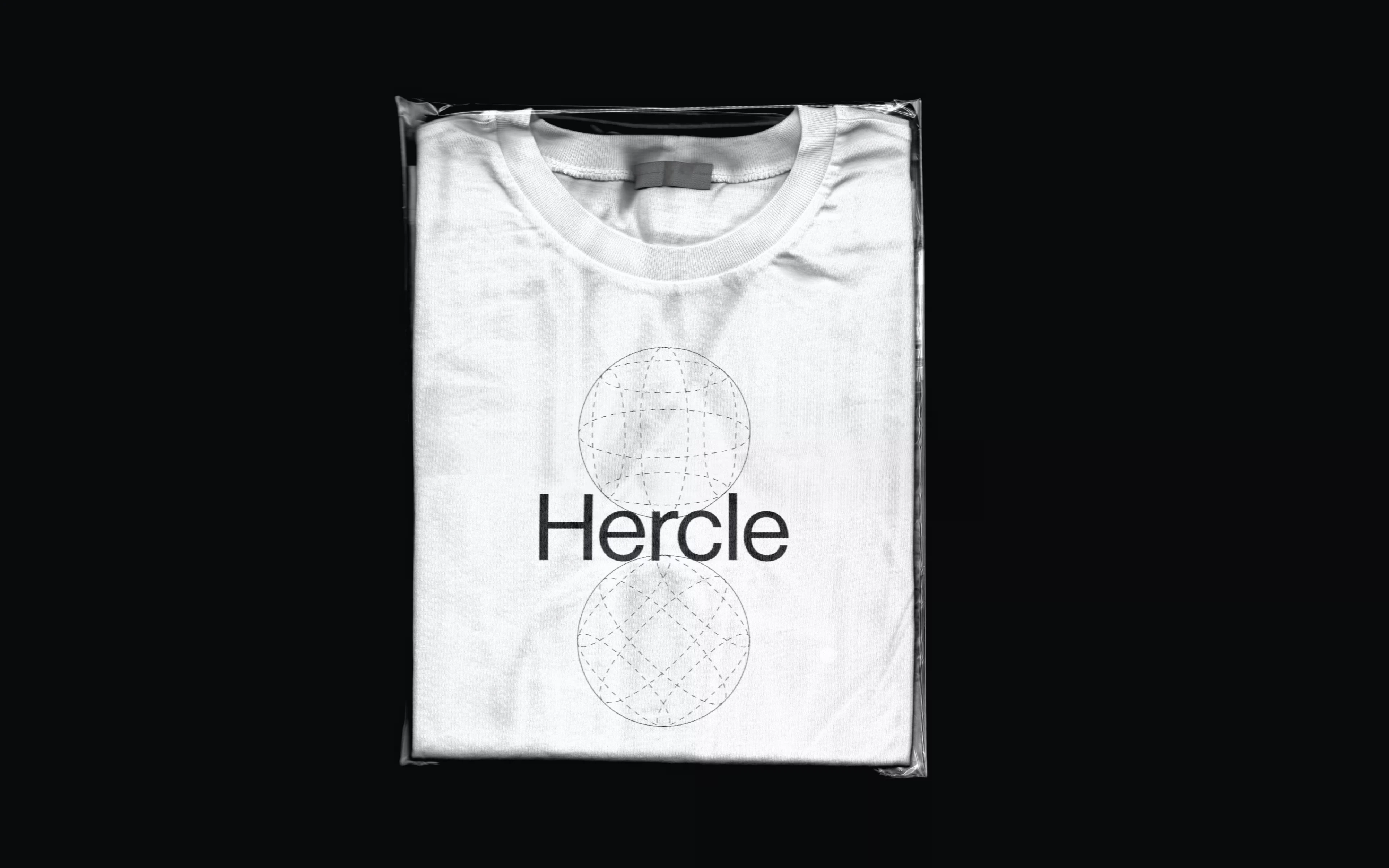 Hercle branded t-shirt folded in its packaging