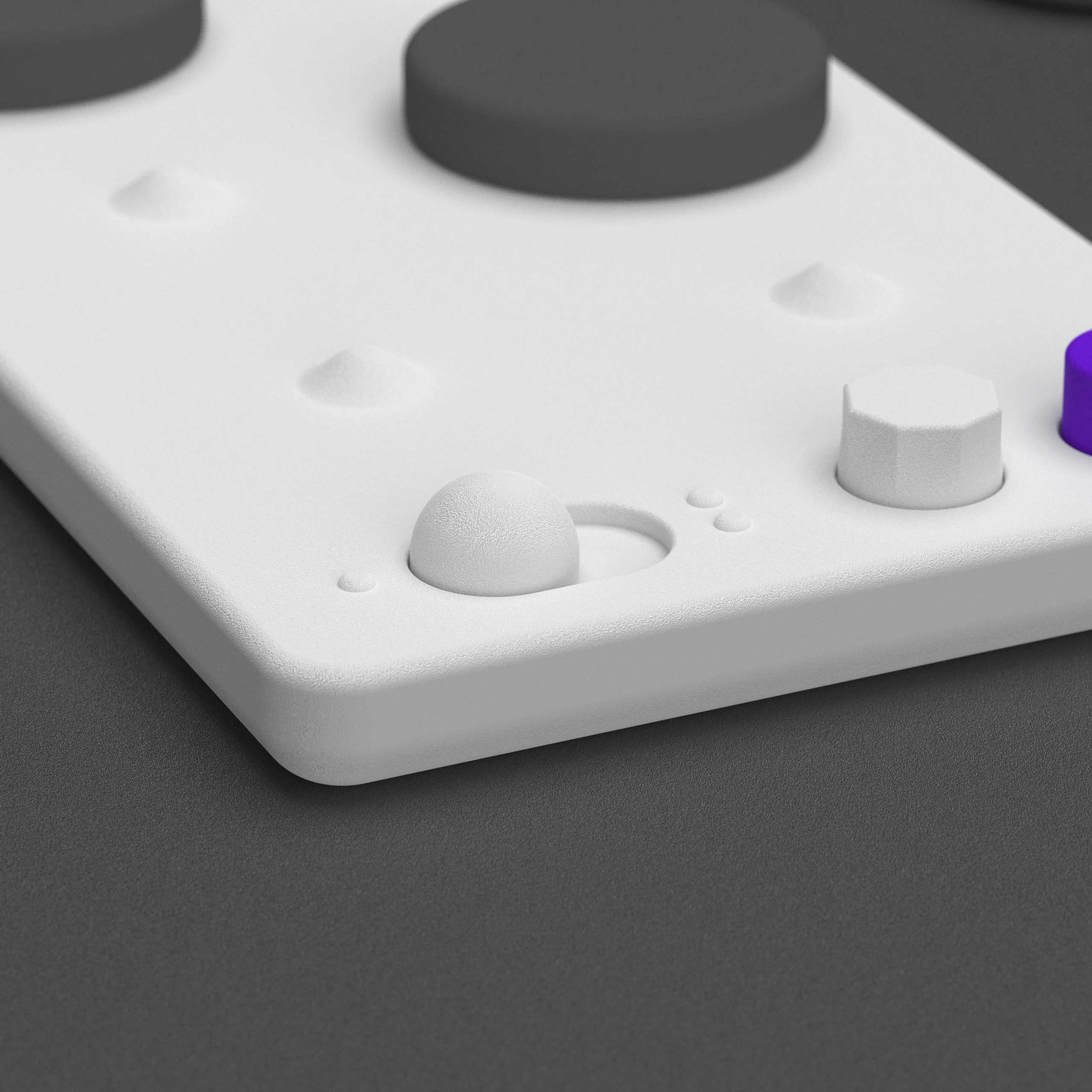 Close-up of the LUII board surface: the empty Braille cell and the dial