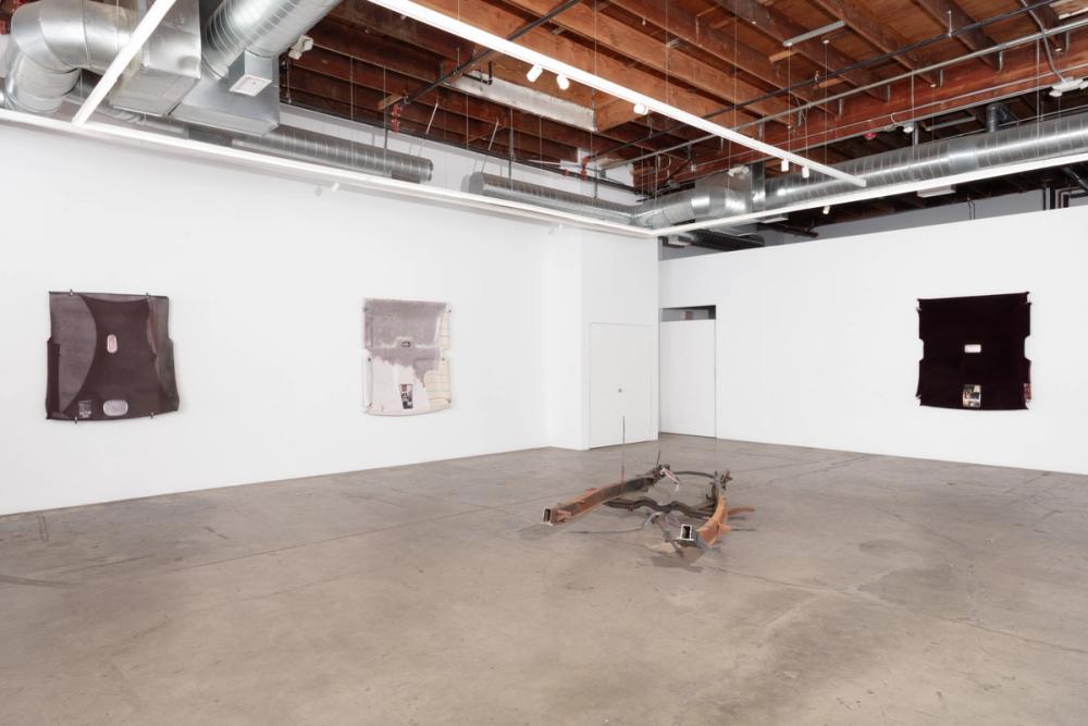 Slide 3 of exhibition installation photos