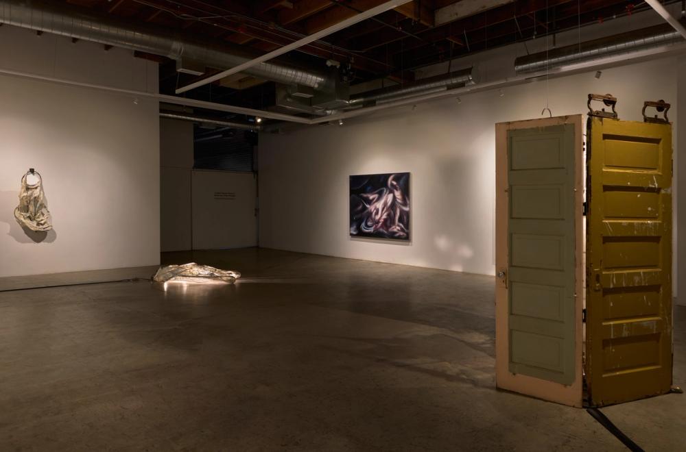 Slide 2 of exhibition installation photos