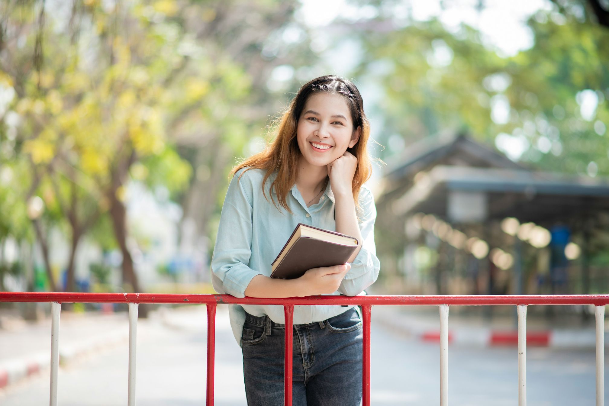 Young university-going woman smiling