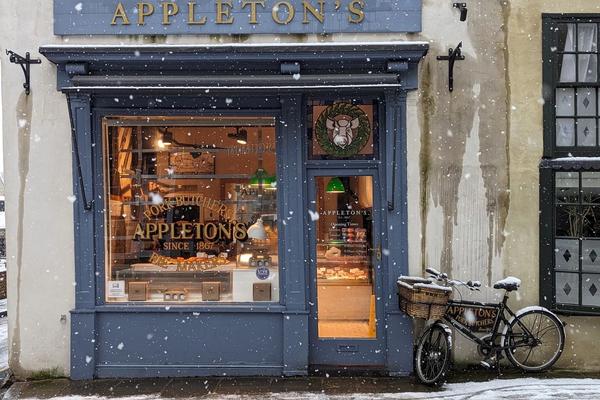 A local butcher shop on a snowy winter day.