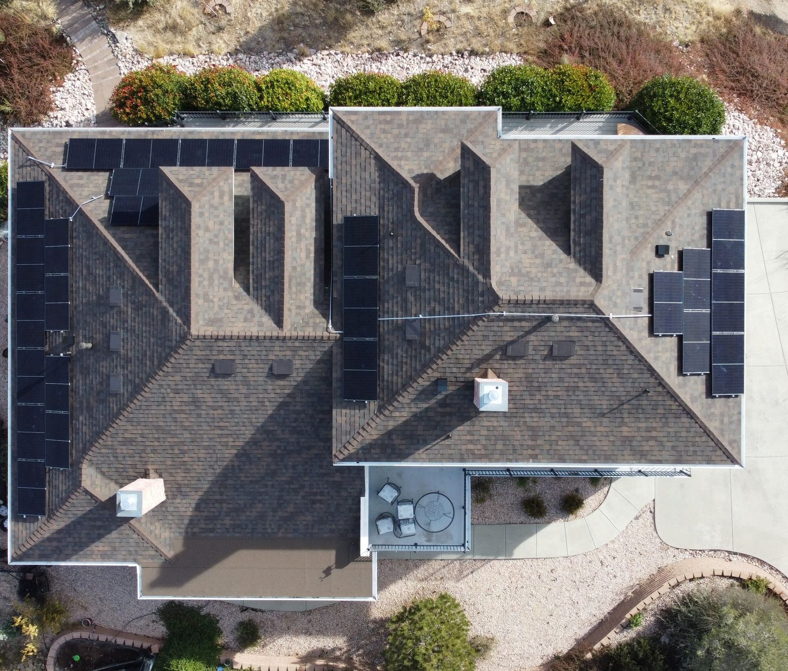A new shingle roof with solar panels, seen from above, Prescott, November 2022.