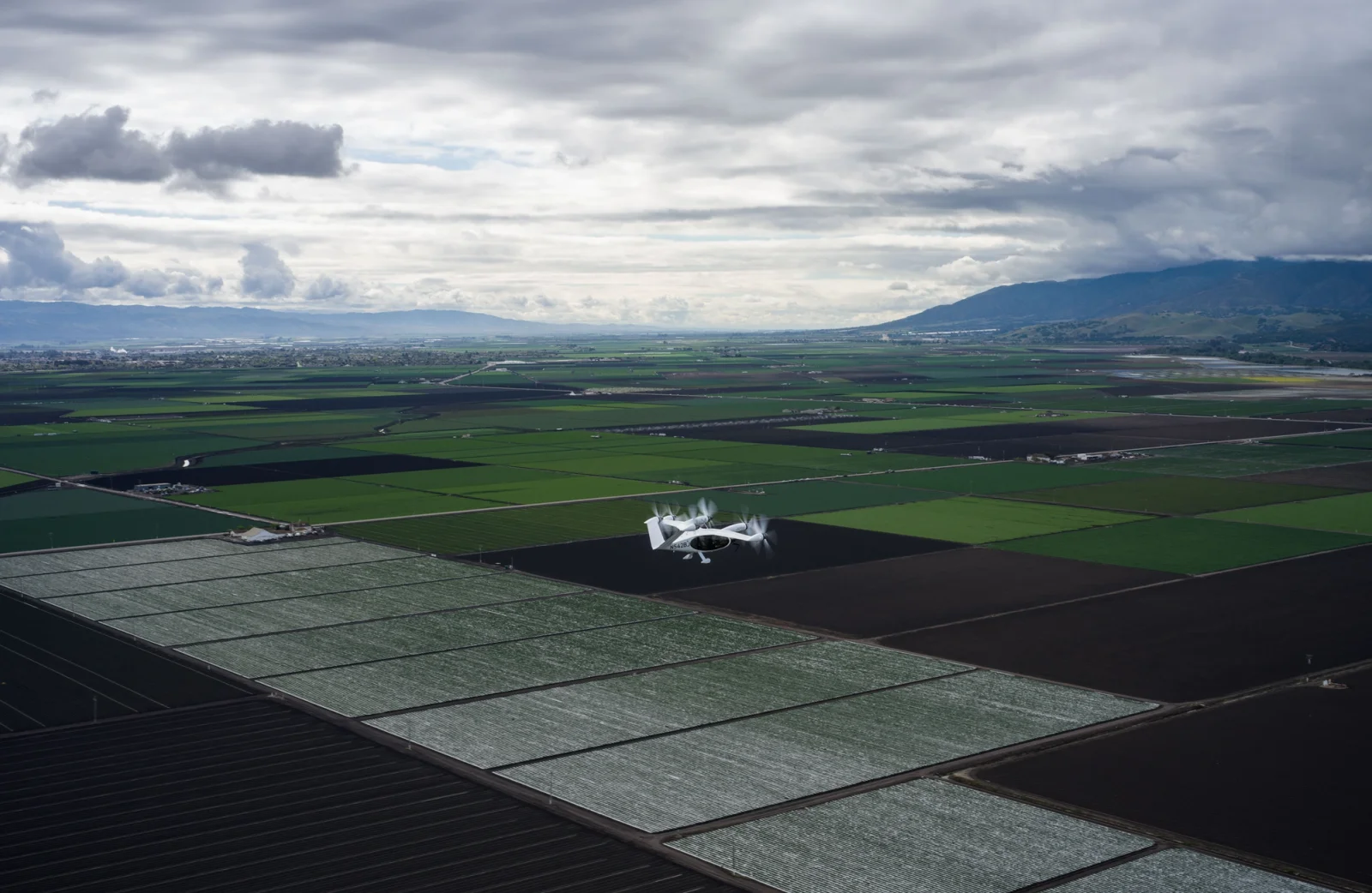 Joby’s pre-production prototype eVTOL aircraft in flight above Marina, California