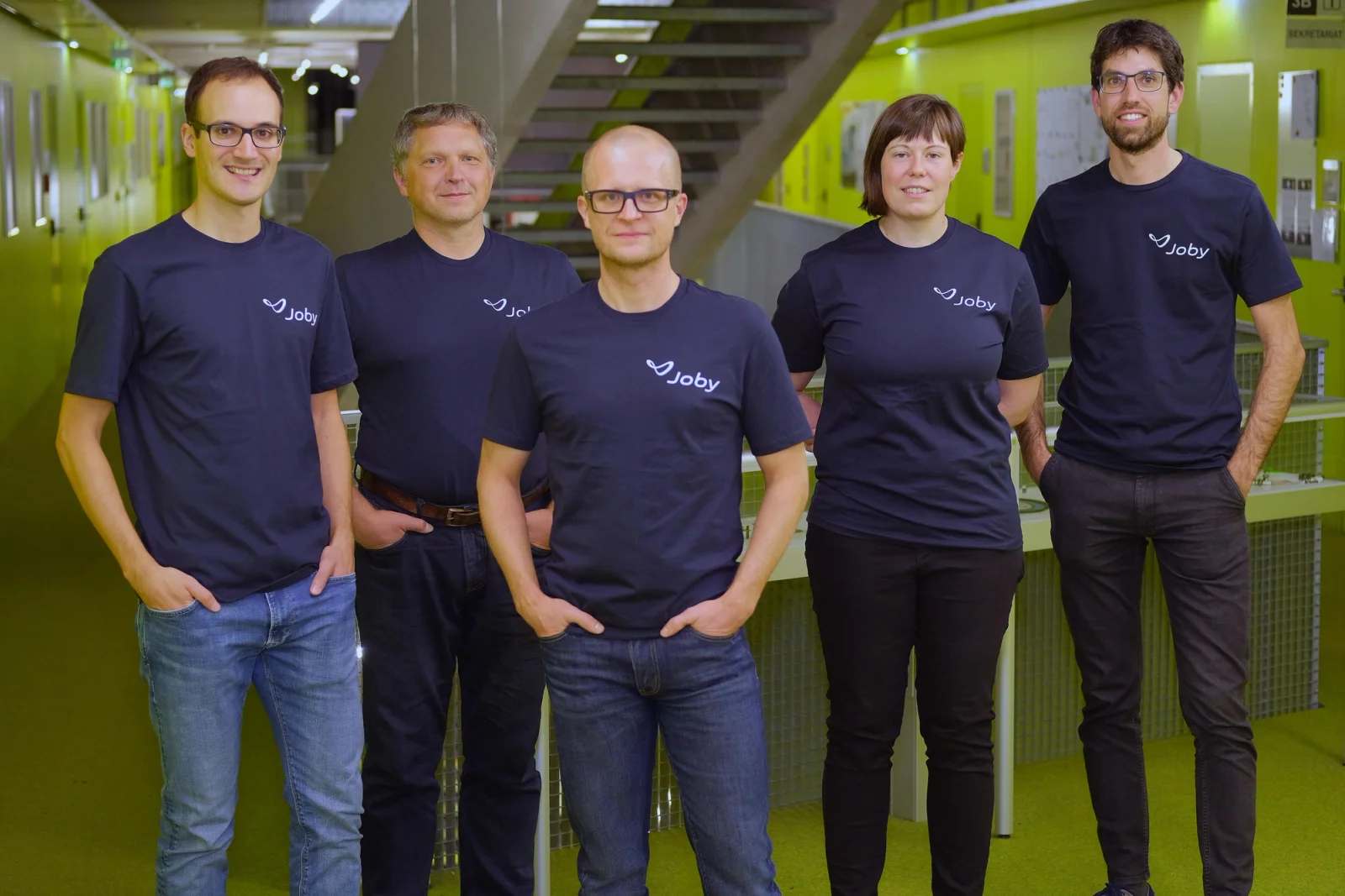 The Inras team standing facing the camera.