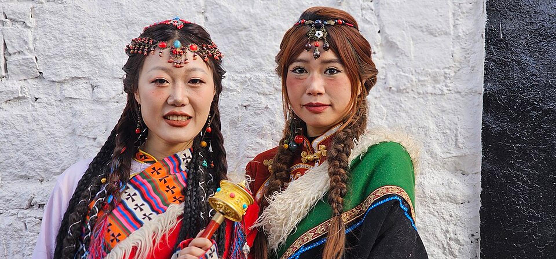 People wearing traditional Tibetan costumes