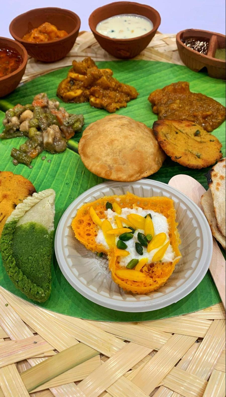A plate of food sitting on a table